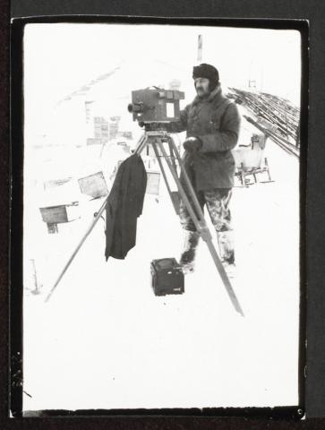Herbert Ponting working in Antarctic conditions, Cape Evans, October 1911. One of a group of 109 photographs taken by Captain Scott whilst on the British Antarctic Expedition 1910-13