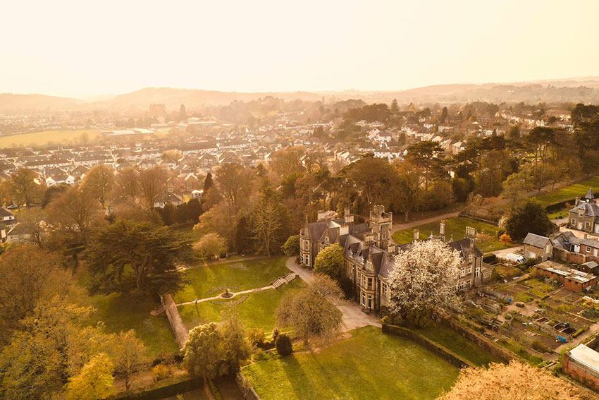 Ariel view of Insole Court when the sun is low.