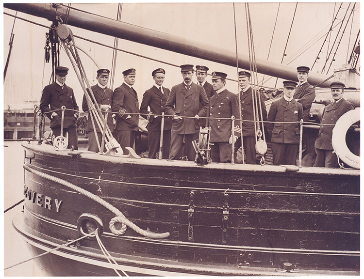 Group of people standing on a ship