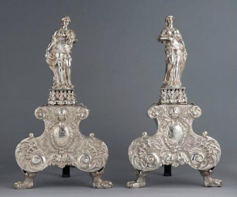 Dated 1680-81, these silver andirons were made to support burning logs in open fireplaces and demonstrate the importance of fireplace furniture during the period Dated 1680-81, these silver andirons were made to support burning logs in open fireplaces and demonstrate the importance of fireplace furniture during the period