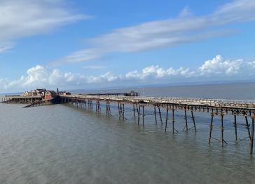 Pier stretching out to sea