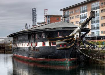 HMS Unicorn docked in a harbour