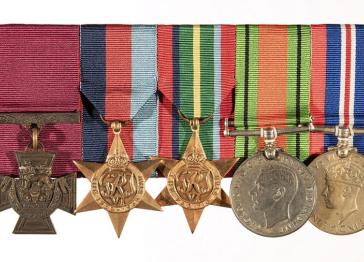 Arthur Scarf's medal bar, including the Victoria Cross on the far left